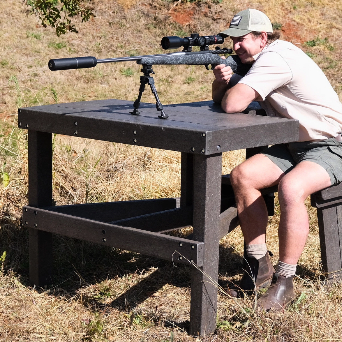 Kwagga Smith shooting from the open-air swivel shooting bench - Green Plastic Wood